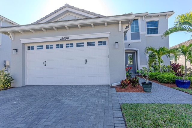 view of front of home with a garage