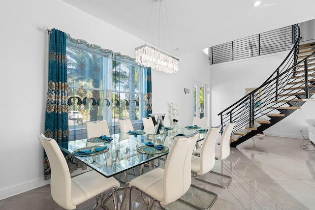 dining room with a notable chandelier