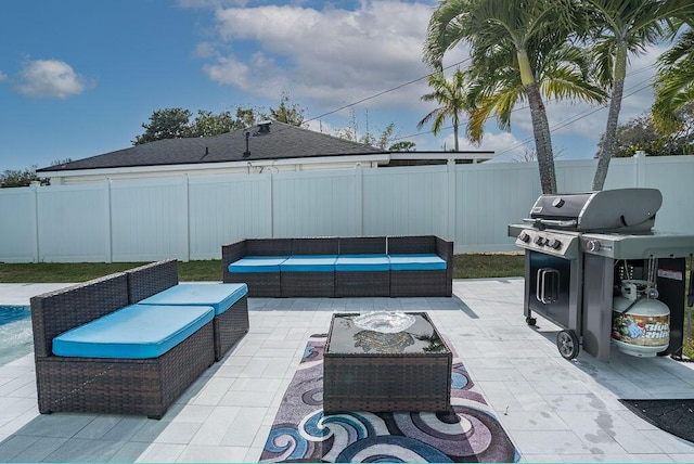 view of patio / terrace featuring a grill and an outdoor hangout area