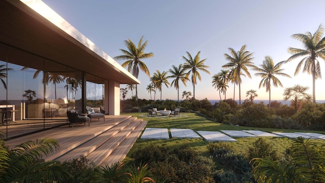 view of home's community with a yard and an outdoor hangout area