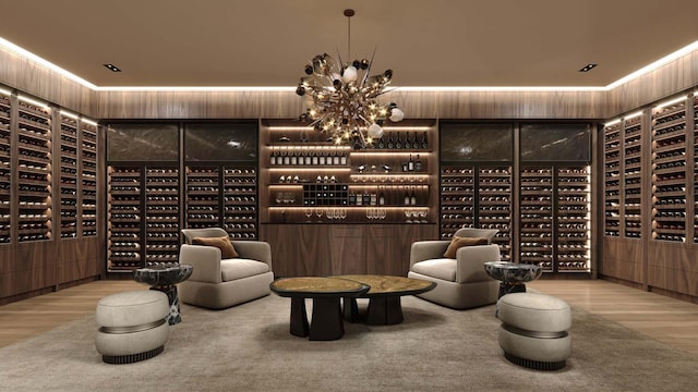 wine cellar with a notable chandelier and light hardwood / wood-style floors