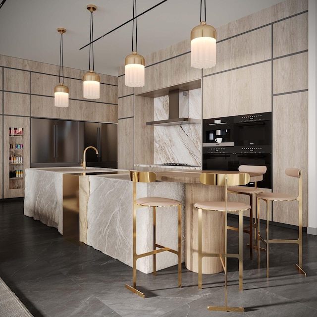 kitchen with light brown cabinets, pendant lighting, wall chimney range hood, and a kitchen breakfast bar