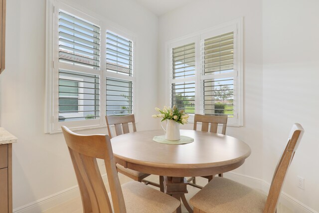 11263 SW Visconti Way, Port Saint Lucie, FL 34986 - dining room featuring plenty of natural light
