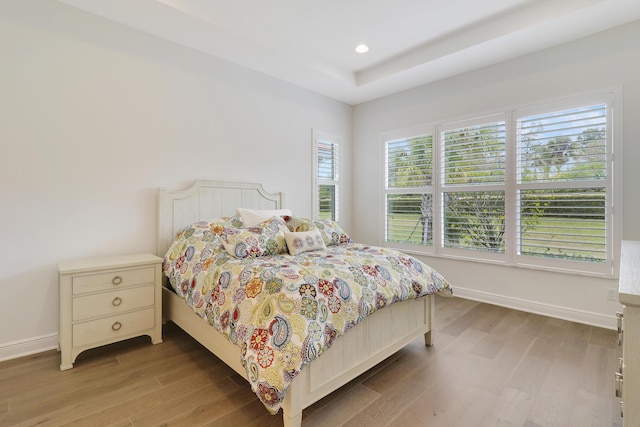 bedroom featuring hardwood / wood-style flooring