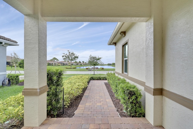 11263 SW Visconti Way, Port Saint Lucie, FL 34986 - view of patio / terrace with a water view