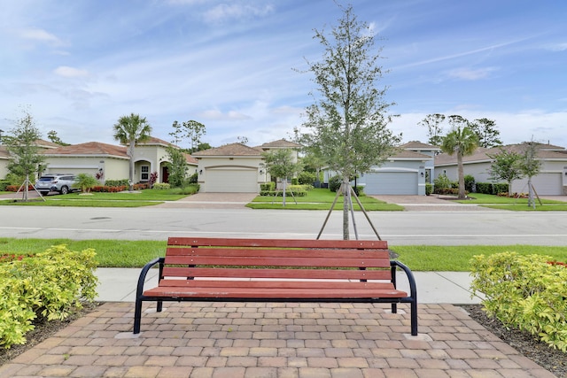 11263 SW Visconti Way, Port Saint Lucie, FL 34986 - surrounding community with a lawn, a residential view, and concrete driveway