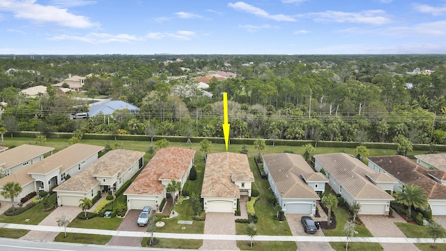 11263 SW Visconti Way, Port Saint Lucie, FL 34986 - aerial view of residential area featuring a tree filled landscape