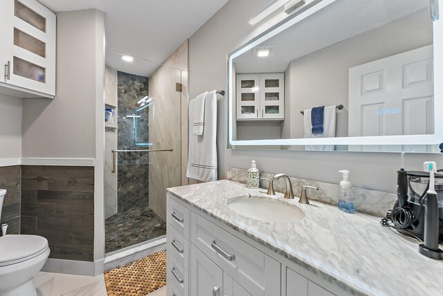 1806 SE Hideaway Cir Unit 1806, Port Saint Lucie, FL 34952 - full bath with a stall shower, toilet, recessed lighting, and vanity