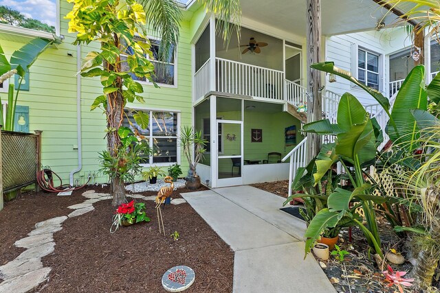 exterior space with ceiling fan, a patio, and fence