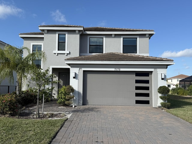 view of front of property featuring a garage