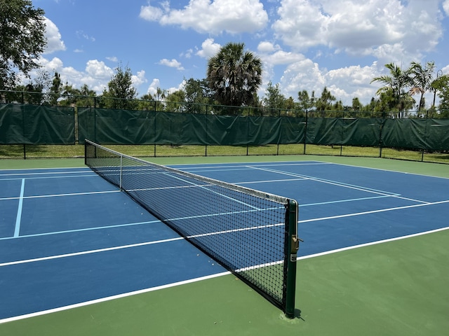 view of tennis court with basketball court