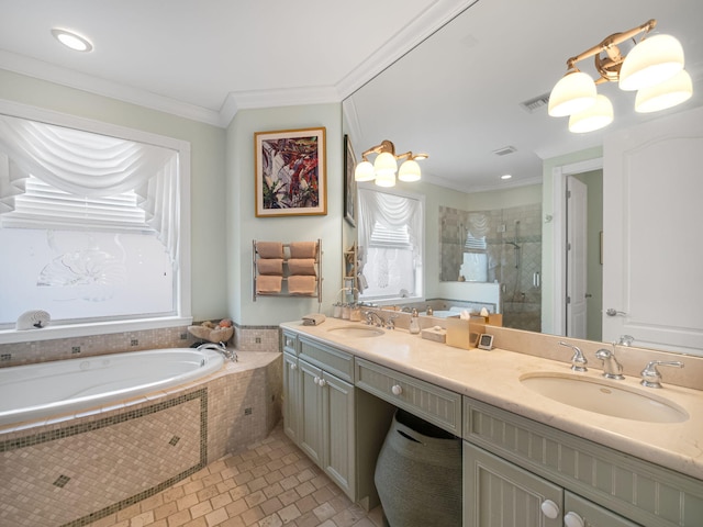 bathroom with a healthy amount of sunlight, ornamental molding, separate shower and tub, and vanity