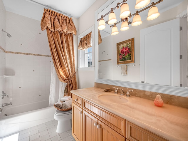 full bathroom featuring tile patterned floors, toilet, vanity, and shower / bath combo