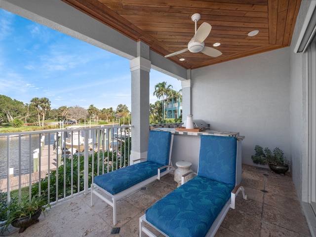 balcony featuring ceiling fan