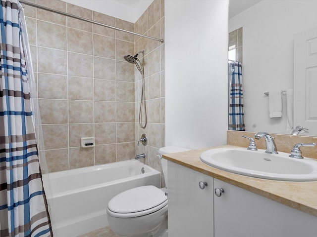 full bathroom with vanity, shower / bath combo, and toilet