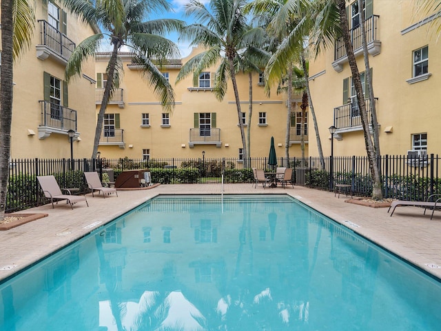 view of swimming pool featuring a patio