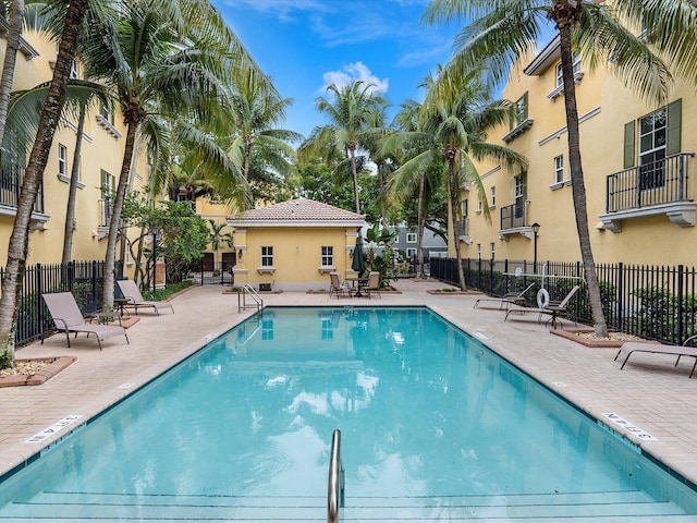 view of swimming pool featuring a patio area