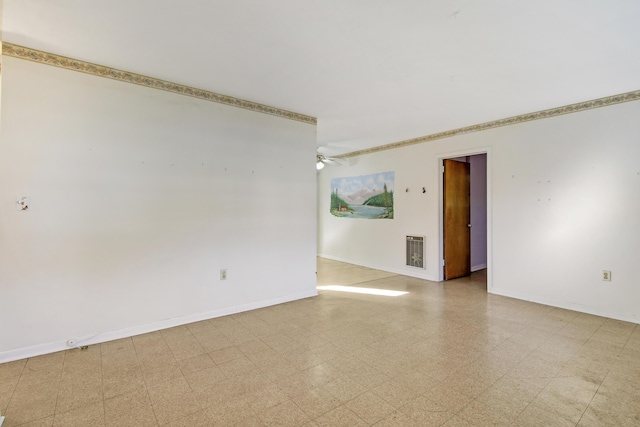 unfurnished room with ceiling fan