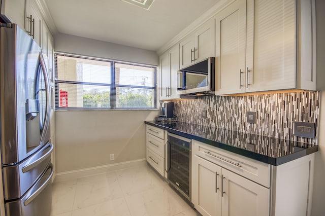 6944 Briarlake Cir Unit 101, Palm Beach Gardens, FL 33418 - kitchen with appliances with stainless steel finishes, wine cooler, dark countertops, baseboards, and light marble finish floors