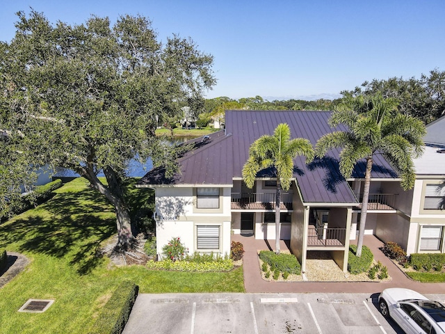 6944 Briarlake Cir Unit 101, Palm Beach Gardens, FL 33418 - view of property with uncovered parking