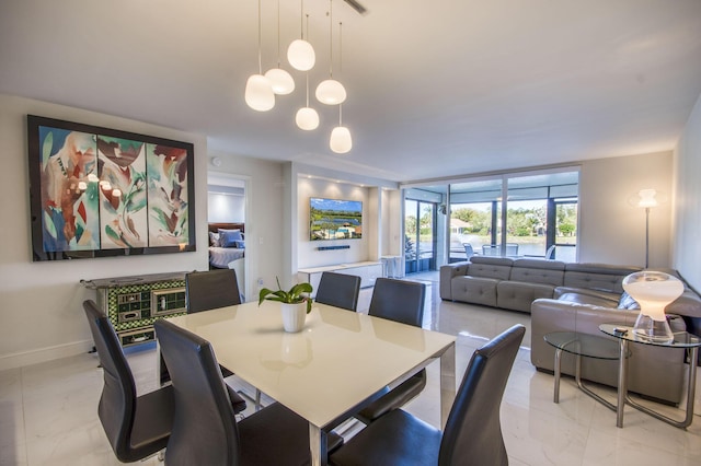 dining area with a chandelier