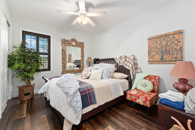 bedroom featuring ceiling fan and dark hardwood / wood-style flooring