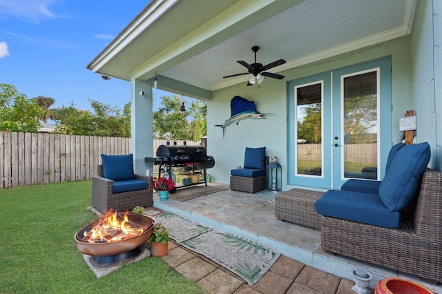 view of patio featuring ceiling fan and a grill