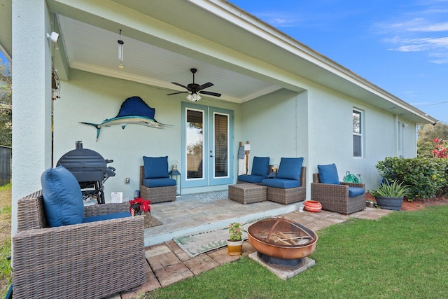 view of patio with ceiling fan and french doors