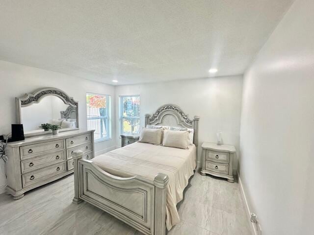 bedroom with a textured ceiling