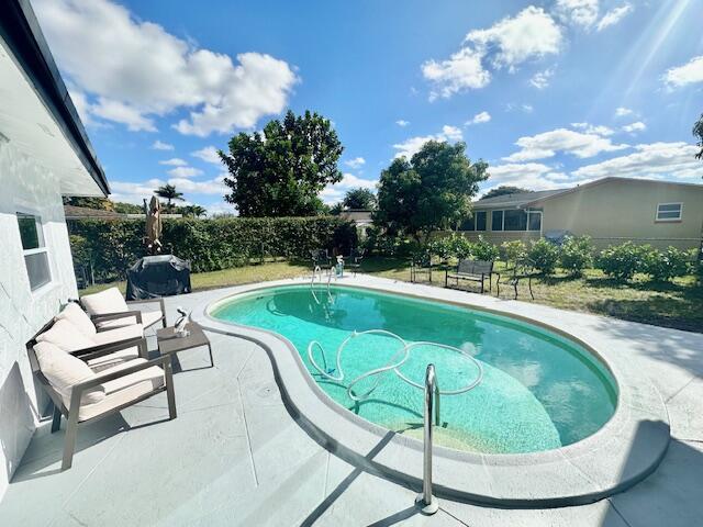 view of pool with a patio