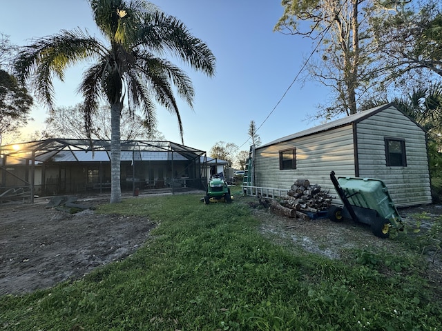 view of yard with a lanai