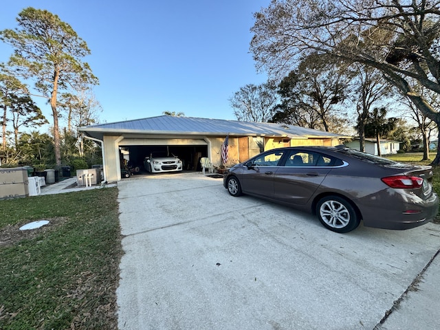 view of side of home featuring a garage