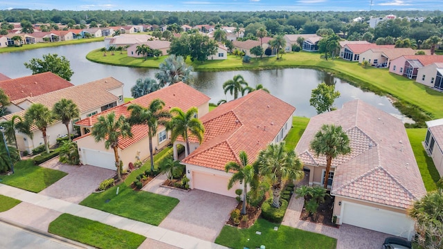 drone / aerial view with a water view