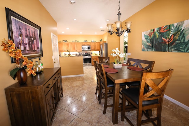 tiled dining space with an inviting chandelier