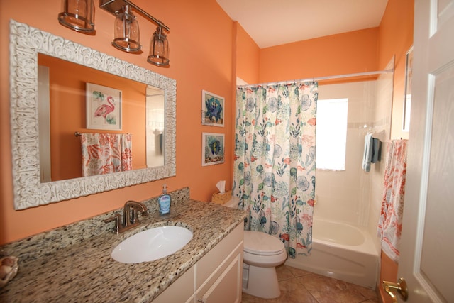 full bathroom featuring toilet, vanity, tile patterned floors, and shower / bathtub combination with curtain