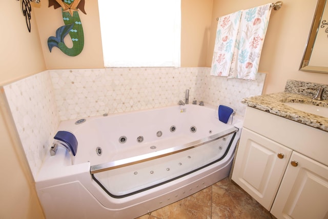 bathroom with vanity and a bathing tub