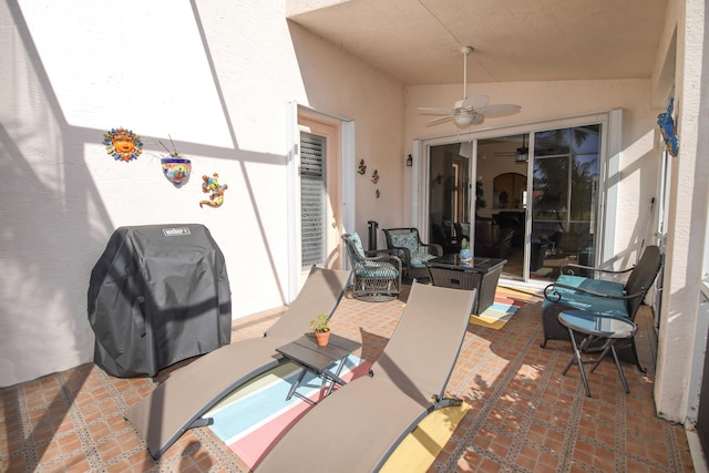 view of patio with grilling area and ceiling fan