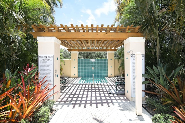 view of patio featuring a pergola