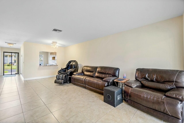 living room featuring light tile patterned flooring