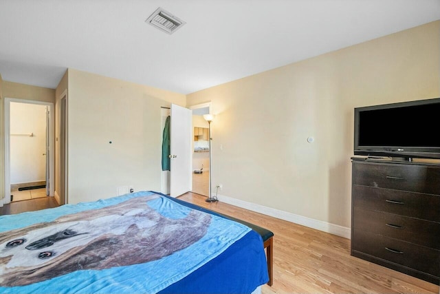 bedroom with light wood-type flooring