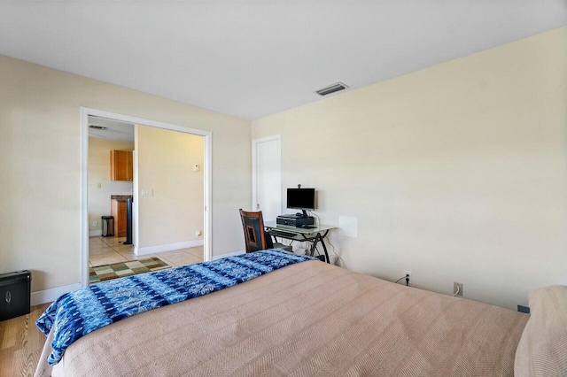 bedroom featuring light hardwood / wood-style flooring