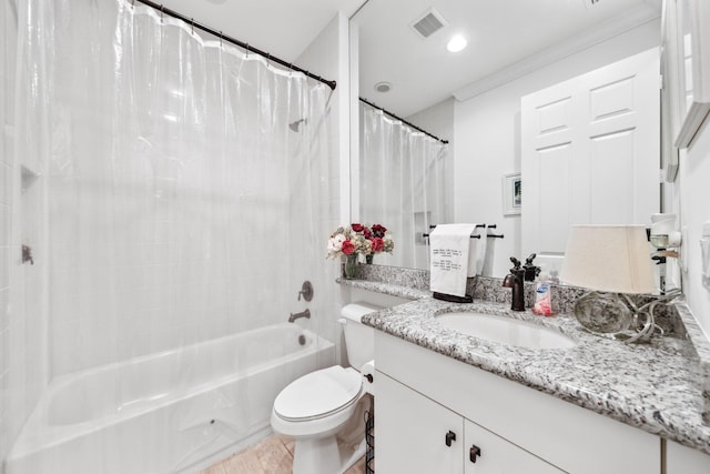 full bathroom featuring toilet, vanity, and shower / bathtub combination with curtain