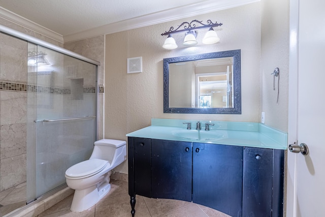 bathroom with an enclosed shower, vanity, crown molding, and toilet