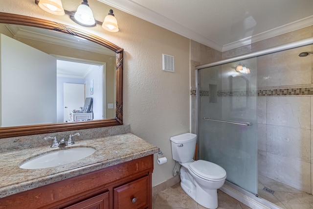 bathroom featuring ornamental molding, vanity, an enclosed shower, toilet, and tile patterned floors