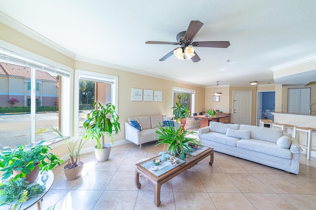 tiled living room with crown molding and ceiling fan