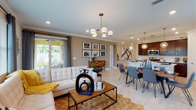 living room featuring a notable chandelier and crown molding