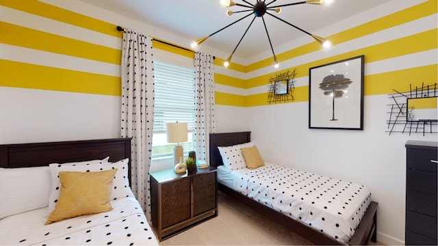 carpeted bedroom with a notable chandelier