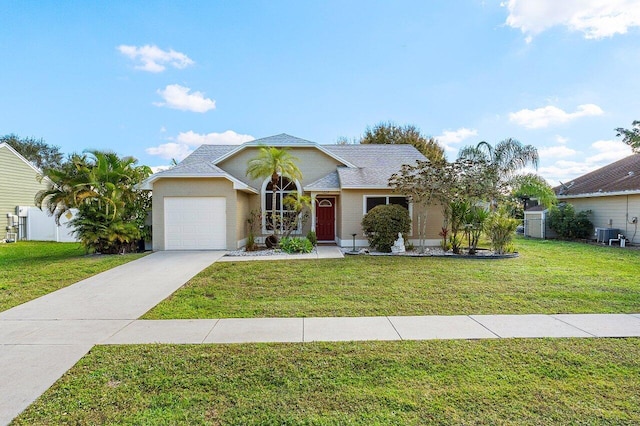 single story home with a garage, central air condition unit, and a front yard