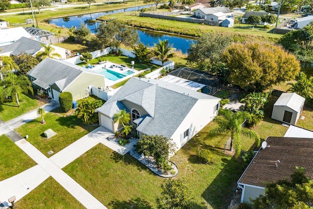 birds eye view of property featuring a water view