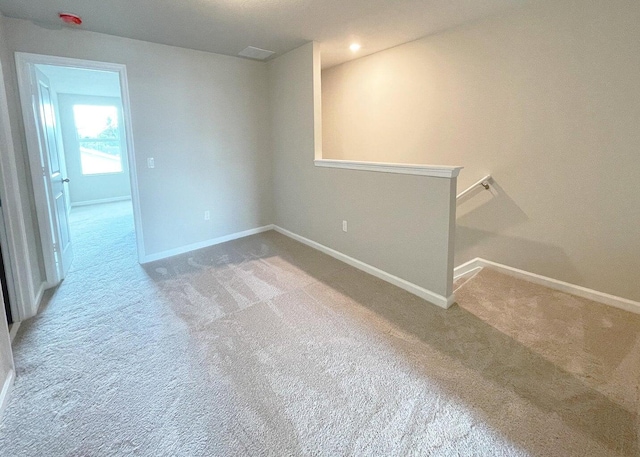 empty room with carpet flooring